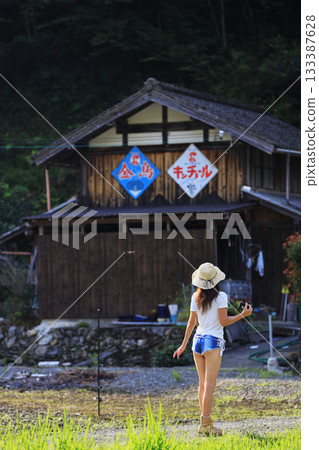 She travels during summer vacation She travels during summer vacation 133387628