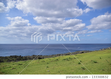 View of the sea and sky from a hill on a remote island in summer View of the sea and sky from a hill on a remote island in summer 133388632