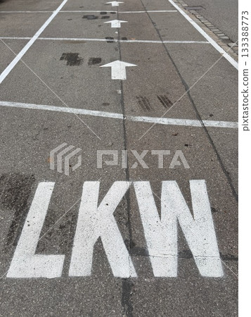 LKW Road Marking with Arrows on Asphalt 133388773