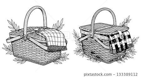 Pair of charming woven picnic baskets with plaid blankets and surrounding leafy branches for outdoor enjoyment Pair of charming woven picnic baskets with plaid blankets and surrounding leafy branches for outdoor enjoyment 133389112