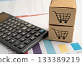 Online shopping, Shopping cart box on business graph, import export, finance commerce. 133389219