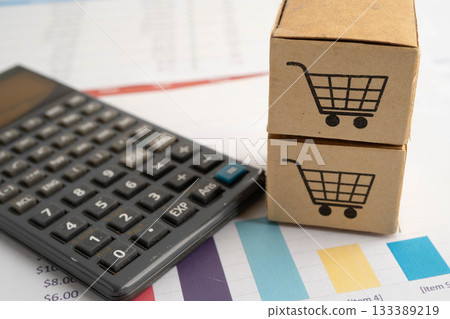 Online shopping, Shopping cart box on business graph, import export, finance commerce. 133389219