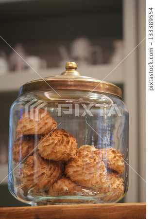 Delicious cookies in a glass jar on display 133389554