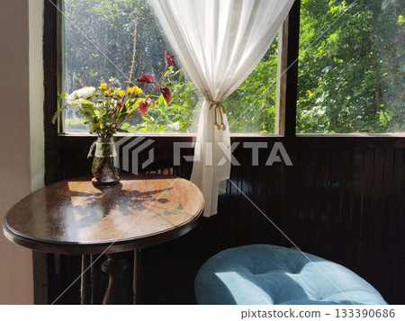 Still life plant in a vase in a cozy interior setting Still life plant in a vase in a cozy interior setting 133390686