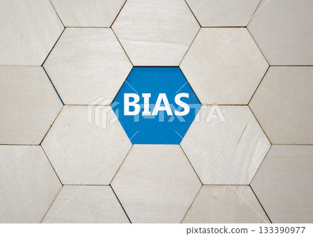 Bias symbol. Concept word Bias on wooden comb puzzle. Beautiful blue background. Business and Bias concept. Copy space. 133390977