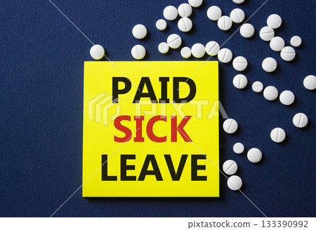 Paid Sick Leave symbol. Concept words Paid Sick Leave on yellow note. Beautiful deep blue background with pills. Healthcare and Paid Sick Leave concept. Copy space. Paid Sick Leave symbol. Concept words Paid Sick Leave on yellow note. Beautiful deep blue background with pills. Healthcare and Paid Sick Leave concept. Copy space. 133390992