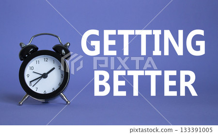 Getting better symbol. Beautiful purple background with alarm clock. Business and Getting better concept. Copy space. 133391005