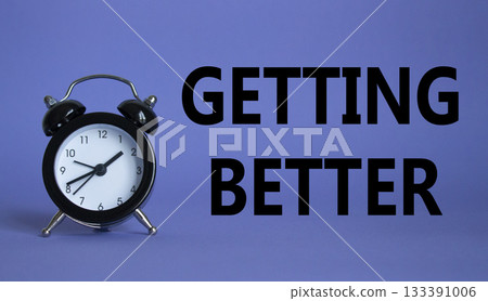 Getting better symbol. Beautiful purple background with alarm clock. Business and Getting better concept. Copy space. Getting better symbol. Beautiful purple background with alarm clock. Business and Getting better concept. Copy space. 133391006
