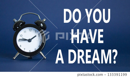 Do you have a Dream symbol. Beautiful deep blue background with alarm clock. Business and Do you have a Dream concept. Copy space. Do you have a Dream symbol. Beautiful deep blue background with alarm clock. Business and Do you have a Dream concept. Copy space. 133391199
