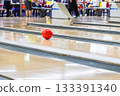 A ball running down a lane in a bowling tournament 133391340