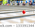 A ball running down a bowling lane 133391344