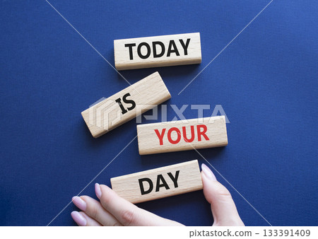 Today is Your Day symbol. Wooden blocks with words Today is Your Day. Businessman hand. Beautiful deep blue background. Business and Today is Your Day. Copy space. 133391409