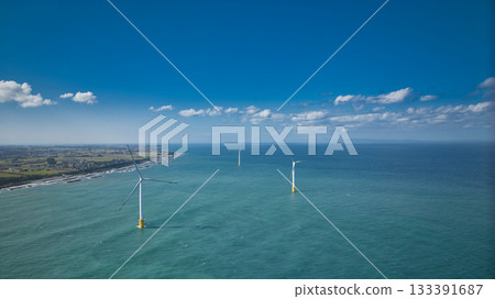 Offshore wind turbines along Shimoniikawa coast in autumn Offshore wind turbines along Shimoniikawa coast in autumn 133391687