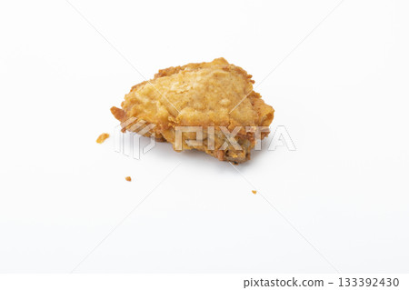 Fried chicken breast in isolated white background 133392430