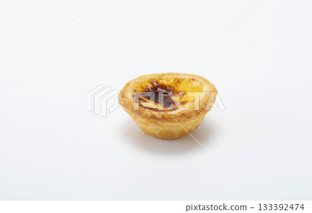Fresh baked egg tart or custard tart (pastel de nata) isolated on white background 133392474