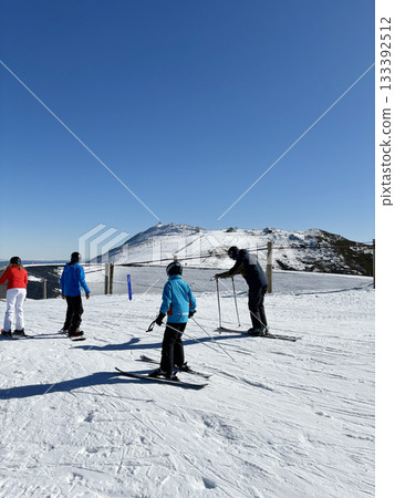 Victoria, Australia - July 4, 2024 : Unidentified people enjoy skiing at Mount Buller Alpine Resort in Victoria, Australia on July 4, 2024. 133392512