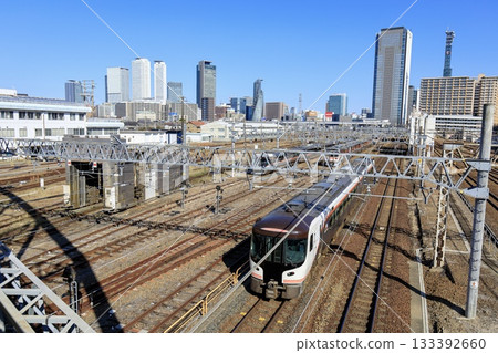 The HC85 Series Nanki Express train runs with the skyscrapers of Nagoya Station in the background. The HC85 Series Nanki Express train runs with the skyscrapers of Nagoya Station in the background. 133392660