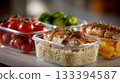Healthy meal prep with grilled chicken rice and assorted vegetables arranged in containers 133394587