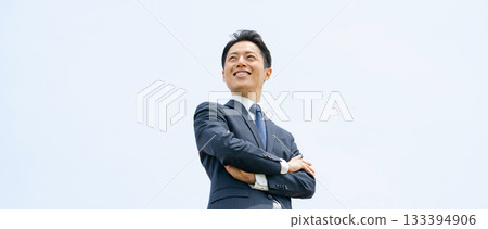 Businessman Sky Arms Crossed Businessman Sky Arms Crossed 133394906