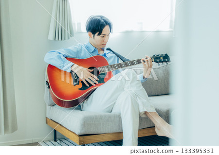 Man playing guitar Man playing guitar 133395331