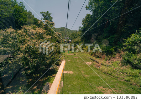 Beijing, China - 3 may 2025 funicular on The Great Wall at Mutianyu  133396882