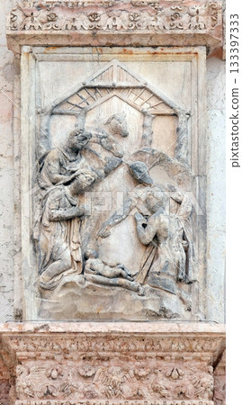 Nativity, Birth of Jesus, panel on the left door of San Petronio Basilica in Bologna, Italy 133397333