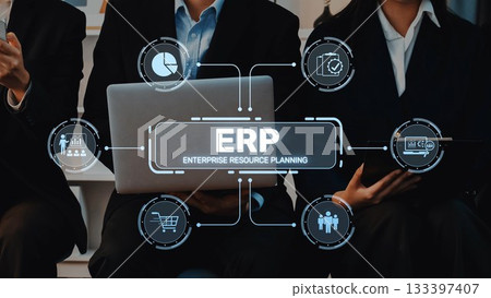 Business professionals engaged in discussion about ERP systems, showcasing data analysis, resource management, and technology integration in modern workspace. Raster Business professionals engaged in discussion about ERP systems, showcasing data analysis, resource management, and technology integration in modern workspace. Raster 133397407