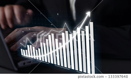 Professional Businessman Analyzing Financial Growth Trends with Digital Graphs and Charts in Modern Office Environment Copula 133397648