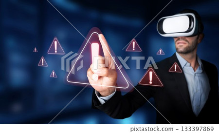 Man in Virtual Reality Headset Engaging with Warning Alerts and Notifications in a Futuristic Digital Environment for Technology and Innovation Concepts. Raster 133397869