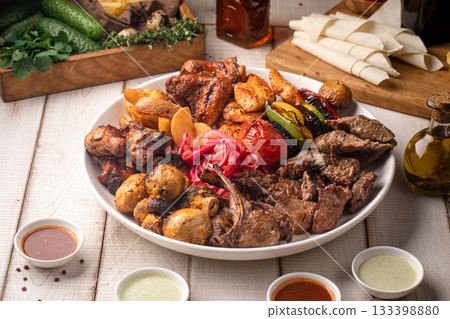 Platter with assorted kebab shashlyq meats Platter with assorted kebab shashlyq meats 133398880