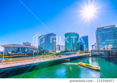 New views of Yokohama cityscape in Japan. The bustling K Arena, the Hilton Yokohama, water buses, and the sparkling water surface... a ray of hope for a new era. 133398957