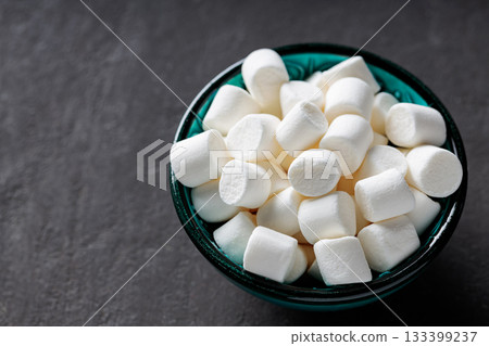 Soft Fluffy Marshmallow Candy in Bowl Minimalist Dessert Concept Soft Fluffy Marshmallow Candy in Bowl Minimalist Dessert Concept 133399237