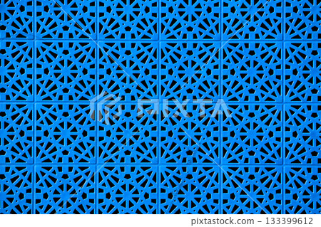 Blue decorative wall pattern in urban setting. 133399612
