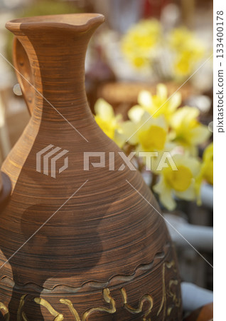The clay pitcher in a outdoor restaurant The clay pitcher in a outdoor restaurant 133400178