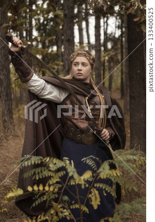 art photo of a warrior girl with a sword in her hands 133400525