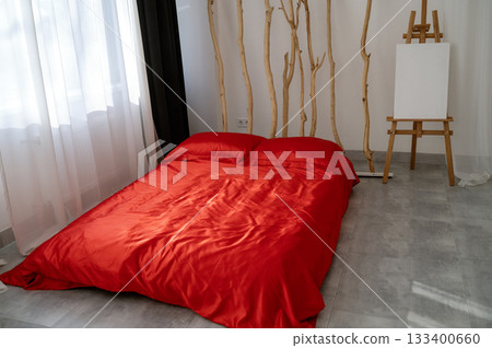 A bedroom with a bed in a room A bedroom with a bed in a room 133400660