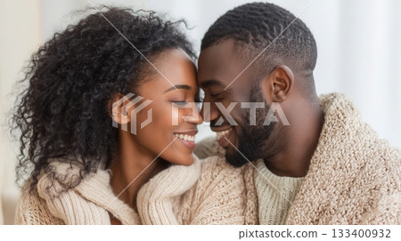 A close-up of a happy African American couple touching foreheads. The scene evokes intimacy, love, and tenderness. Ideal for relationship articles, or Valentine's Day promotions. A close-up of a happy African American couple touching foreheads. The scene evokes intimacy, love, and tenderness. Ideal for relationship articles, or Valentine's Day promotions. 133400932