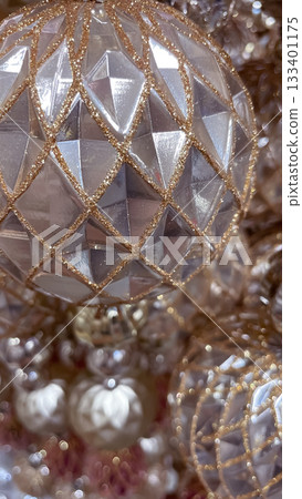 Intricate pink and silver Christmas decorations with beaded tassels and diamond patterns 133401175