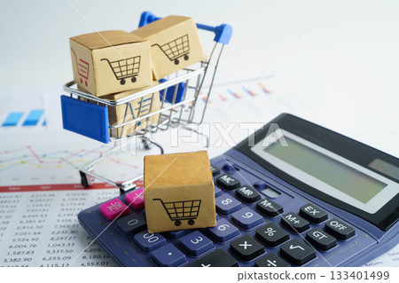 Online shopping, Shopping cart box on calculator, import export, finance commerce. 133401499