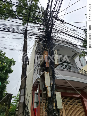 Vietnam Street Electrical Wires on Utility Pole 133403903