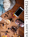 autumn cozy and warm composition with coffee at wooden table with leaves. life style concept. flat lay 133404422