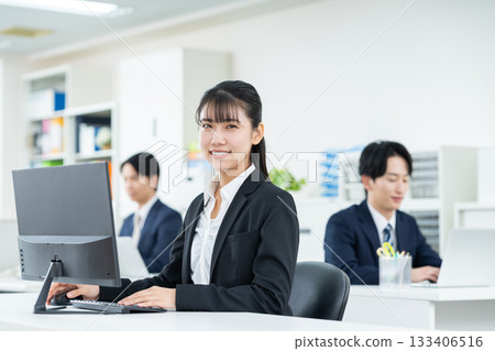 Young business woman working in the office Young business woman working in the office 133406516