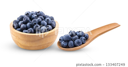 Blueberries in wood bowl wood spoon  isolated on white background 133407249