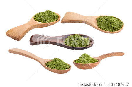 matcha green tea powder in wood spoon on white background matcha green tea powder in wood spoon on white background 133407627