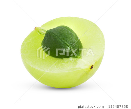 Fresh half Indian gooseberries on white background Fresh half Indian gooseberries on white background 133407868