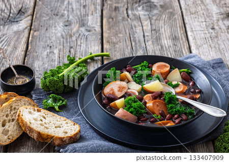 Red kidney bean, potato, kale and sausage soup 133407909