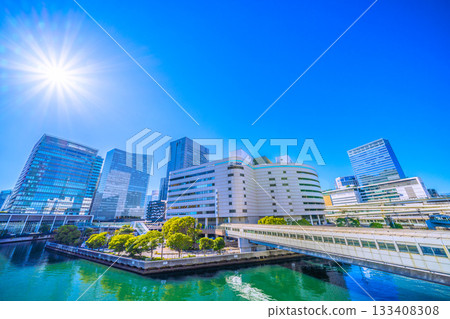 Yokohama cityscape in Japan, overlooking the Sogo Yokohama department store on the east side of Yokohama Station. JR Yokohama Tower is in the background on the right... a ray of hope. (22nd) 133408308