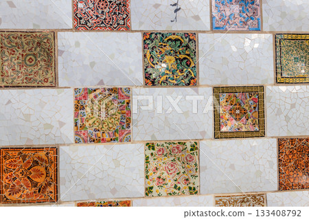 Mosaic wall by Antoni Gaudi in the Park Guell in Barcelona, Catalonia, Spain Mosaic wall by Antoni Gaudi in the Park Guell in Barcelona, Catalonia, Spain 133408792