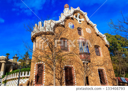 Fairytale gingerbread house in Park Guell designed by Antoni Gaudi in Barcelona, Spain Fairytale gingerbread house in Park Guell designed by Antoni Gaudi in Barcelona, Spain 133408793