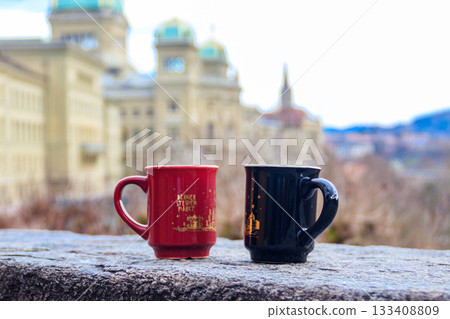 Two cups of mulled wine against of Bern cityscape, Switzerland 133408809